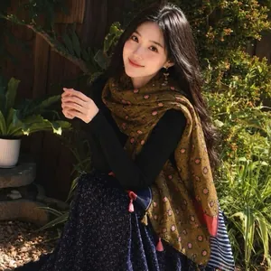 Asian model wearing a vintage floral cotton linen scarf shawl in an outdoor garden setting.