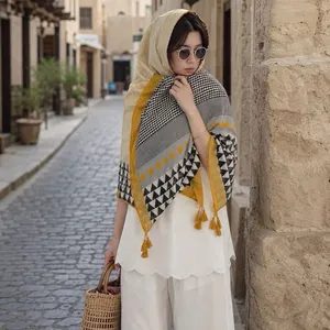 Elegant vintage Maillard style printed scarf with tassels for an early autumn look
