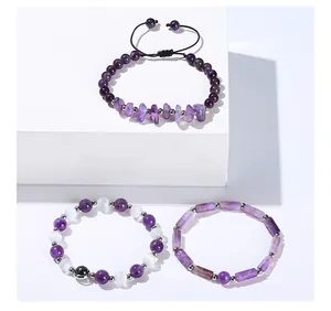 Detailed view of natural amethyst crystal bracelets with irregular beads and silver spacers.