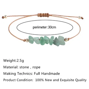 Detailed view of handmade bohemian bracelet with green irregular stones and wax rope