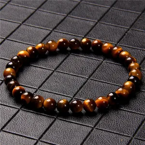 Detailed view of natural brown Tiger's Eye stone beaded bracelet with 6mm round stones