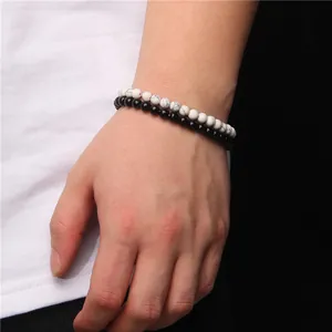 Set of two minimalist 6mm natural stone beaded bracelets for men and women on wrist
