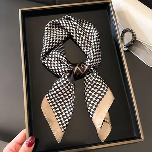 Elegant square silk scarf with black white houndstooth pattern and golden buckle decoration