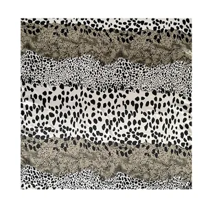 Close-up detail of the leopard print pattern on the 90x90cm satin square scarf