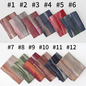 Detailed collection of 12 gradient pleated rayon scarves in various ethnic colors