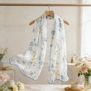 Close-up of French floral Georgette long scarf for women with blue border detail