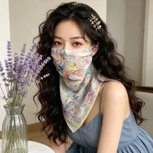 Elegant floral sun protection mask scarf worn by a model for a breathable summer look