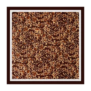Detailed view of 90x90cm satin square scarf featuring a bold brown leopard print pattern