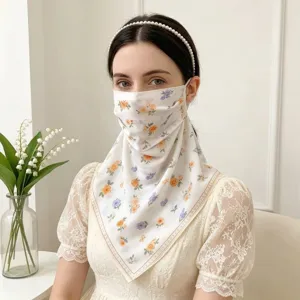 Floral sunscreen face mask scarf worn by a model for UV protection and neck coverage