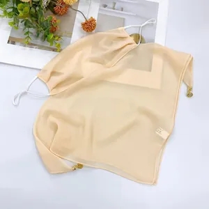 Detailed view of lightweight breathable chiffon sun protection face veil with magnetic clasp