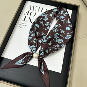 Elegant brown silk neck scarf with blue floral pattern and magnetic pearl buckle