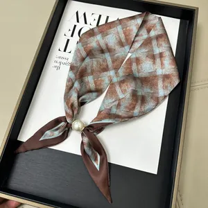 Elegant brown plaid silk scarf featuring a white magnetic pearl buckle accessory