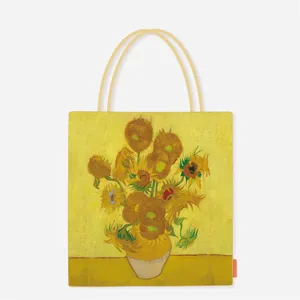 Artistic canvas tote bag featuring Van Gogh's Sunflowers print in high detail.