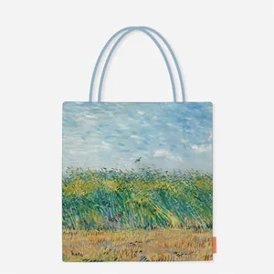 Detail view of Van Gogh's Wheat Field with a Lark print on a stylish canvas tote bag.