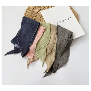 Variety of solid color linen skinny scarves for summer styling and neck protection.