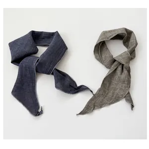 Detailed view of two minimalist ramie linen skinny neck scarves in navy and grey colors