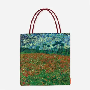 Detail of a large canvas tote bag featuring Van Gogh's Poppy Field oil painting print.