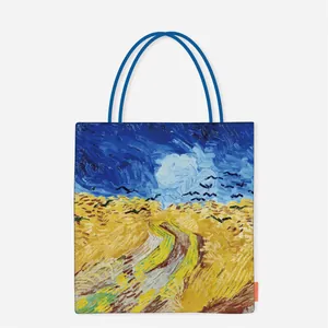 Detailed view of Van Gogh oil painting print on a stylish blue-handled canvas bag