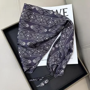 Elegant black and white patterned silk triangular scarf for versatile waist or head styling