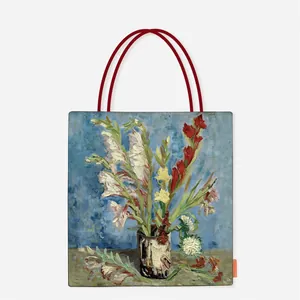 Detail of Van Gogh oil painting canvas tote bag featuring floral print and red straps.