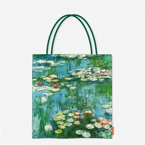Detailed view of Claude Monet Water Lilies oil painting print on a canvas tote bag