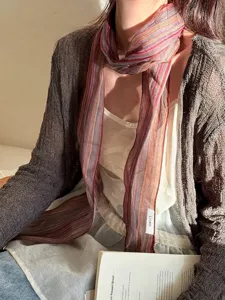 Retro Japanese 100% linen striped scarf styled with a cardigan and a book