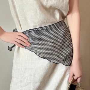 Vintage black and white gingham linen triangular scarf used as a waist accessory.
