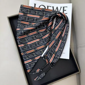 Elegant black silk triangle scarf with orange stripes and chain pattern detail