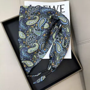 Elegant dark blue paisley print triangular silk waist scarf with floral patterns