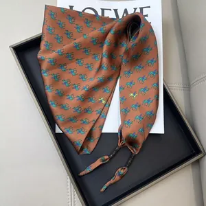 Saint Martin brown silk triangular scarf with elegant horse print and beaded tassels