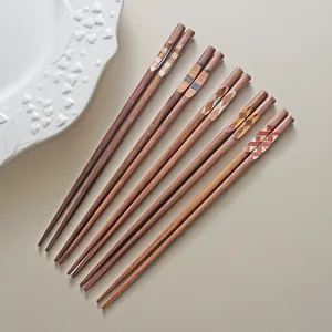 Japanese black walnut wood chopsticks with various geometric Wamon patterns, set of 5 pairs