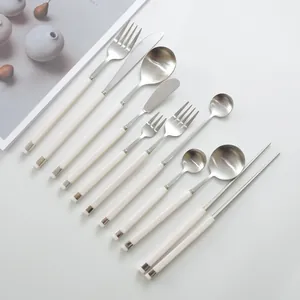 Complete 11-piece Nordic style stainless steel cutlery set with elegant cream handles
