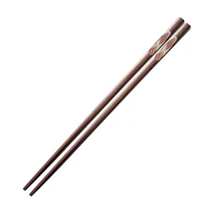 Traditional Japanese black walnut wooden chopsticks with decorative diamond pattern