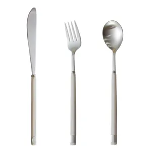 Elegant Nordic 304 stainless steel cutlery set with white handles, knife fork and spoon