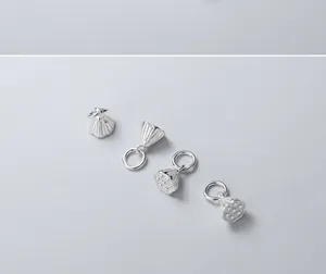 Macro-weergave van S925 sterling zilveren lotushangers voor het maken van DIY-sieraden
