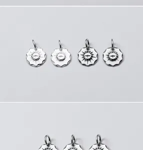 Close-up detail of four S925 sterling silver 11mm round pendants featuring engraved bird motifs.