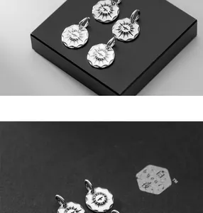 Detailed macro view of retro S925 sterling silver 11mm bird round charms for jewelry DIY