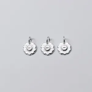 Three vintage S925 sterling silver 11mm round pendants with delicate bird engravings