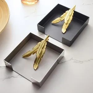 Danish style stainless steel napkin holder with golden feather press weight