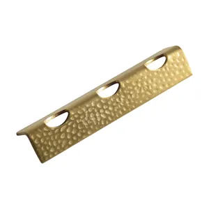 Japanese style hammered stainless steel chopstick rest and spoon holder in gold finish