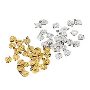 Conjunto de colgantes de corazón en oro y plata con 26 letras para creación de joyas DIY