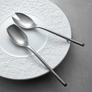 Elegant 304 stainless steel serving spoon and fork set with a matte grey finish