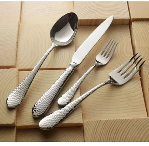 Detailed close-up showing the hammered texture on 304 stainless steel cutlery handles