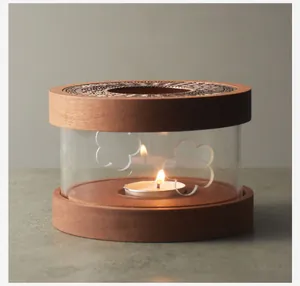 Close-up of a premium walnut wood candle tea warmer featuring decorative floral glass details