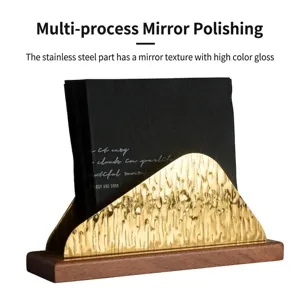 Nordic gold stainless steel napkin holder with wooden base for restaurant table