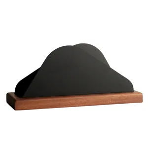 Minimalist Nordic napkin holder with solid wood base and black metal cloud design