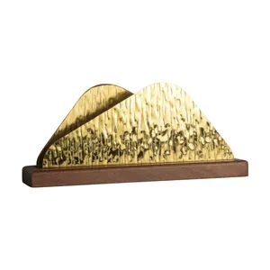 Nordic minimalist gold textured napkin holder with elegant walnut wood base decor