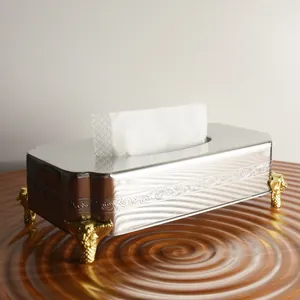 Luxe roestvrijstalen tissuebox voorzien van gouden adelaarspoten en elegante gravures