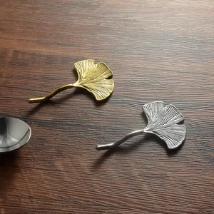 Elegant ginkgo leaf 304 stainless steel chopstick rests in gold and silver finish