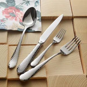 Premium hammered texture stainless steel cutlery set including steak knife forks and spoon